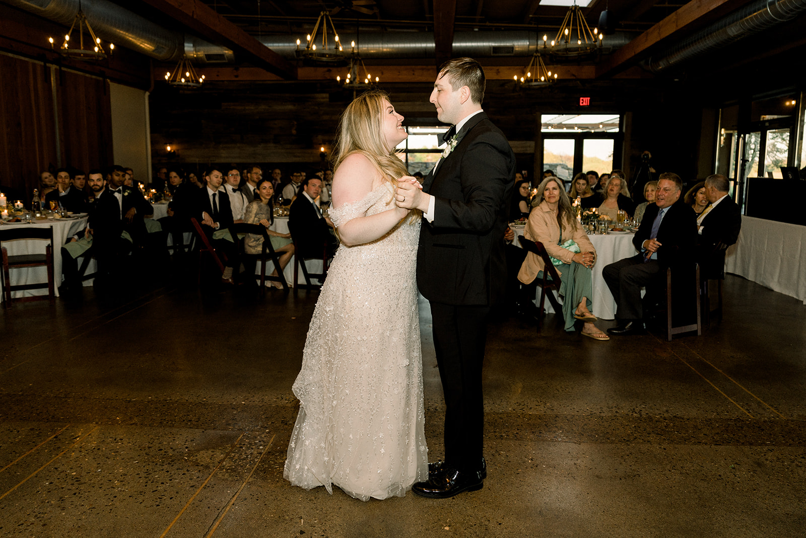 beautiful bride and groom dancing together on their wedding day